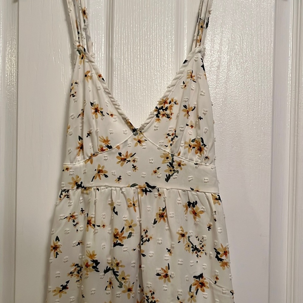 Long white dress with yellow flowers. Small